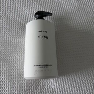 Byredo Suede Hand Lotion in White with Black Pump